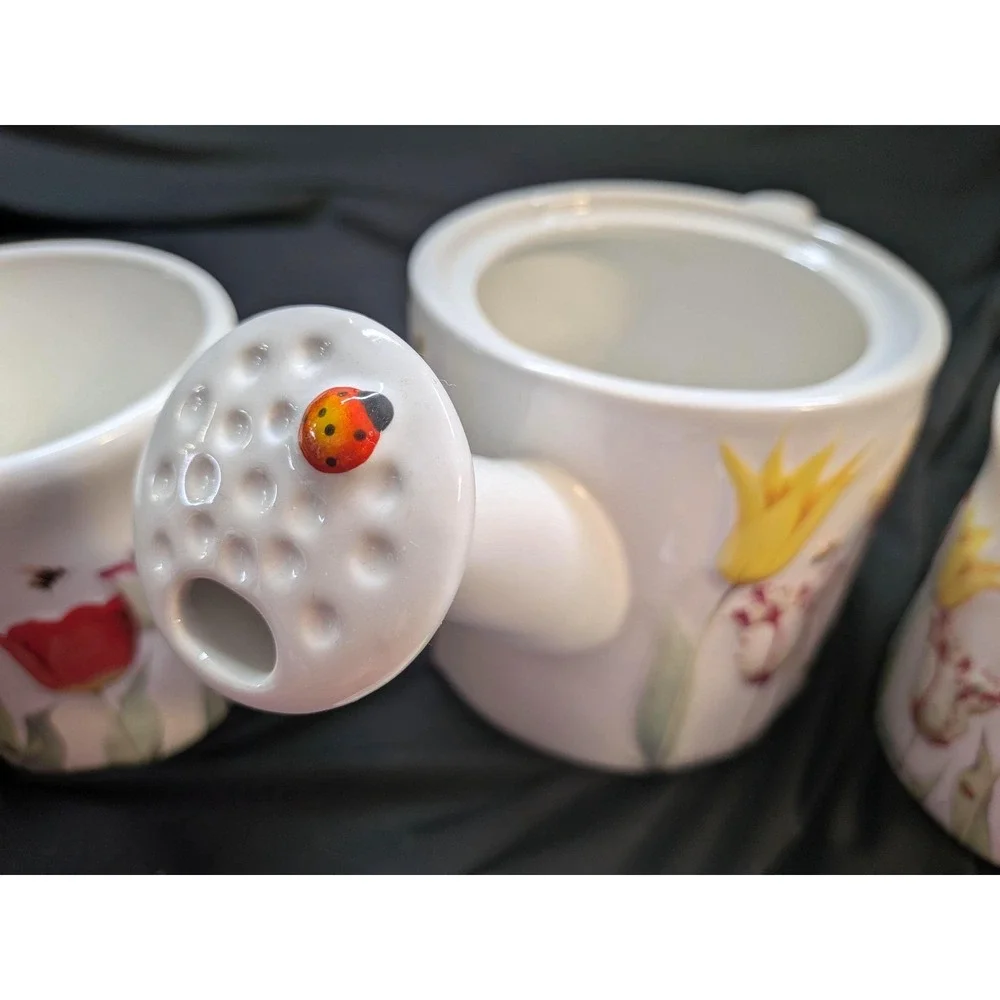Teapot with two matching mugs